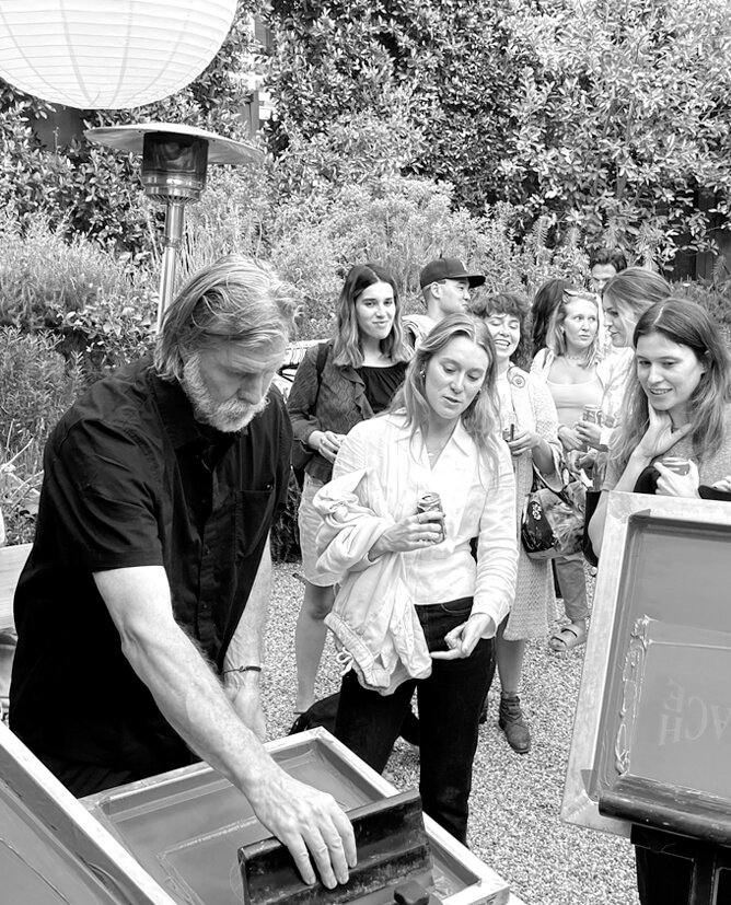 Live Screen Printing in front of spectators at a marketing event activation
